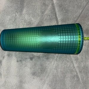 Green waffle studded Starbucks cup